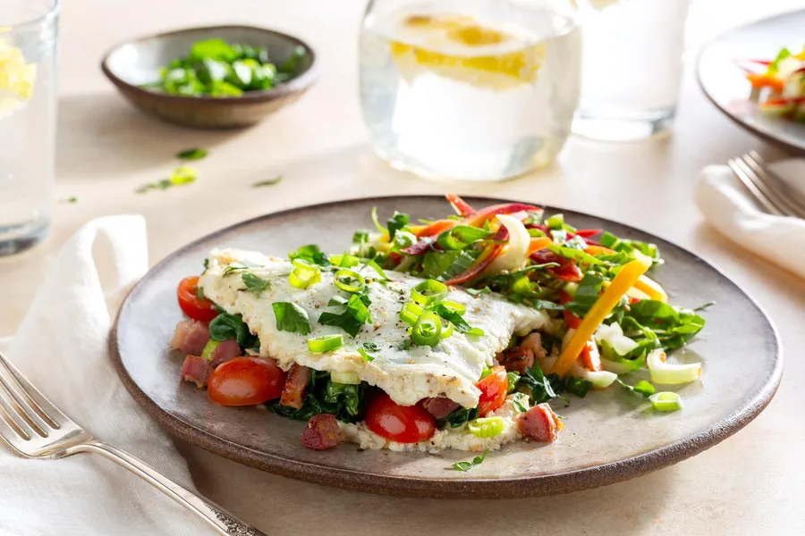 20 High-Protein Low-Calorie Breakfast Ideas (Under 400 Calories) | Eati: [Egg White Omelette with Spinach](/blog/egg-white-omelette-spinach-recipe) — illustration for this section