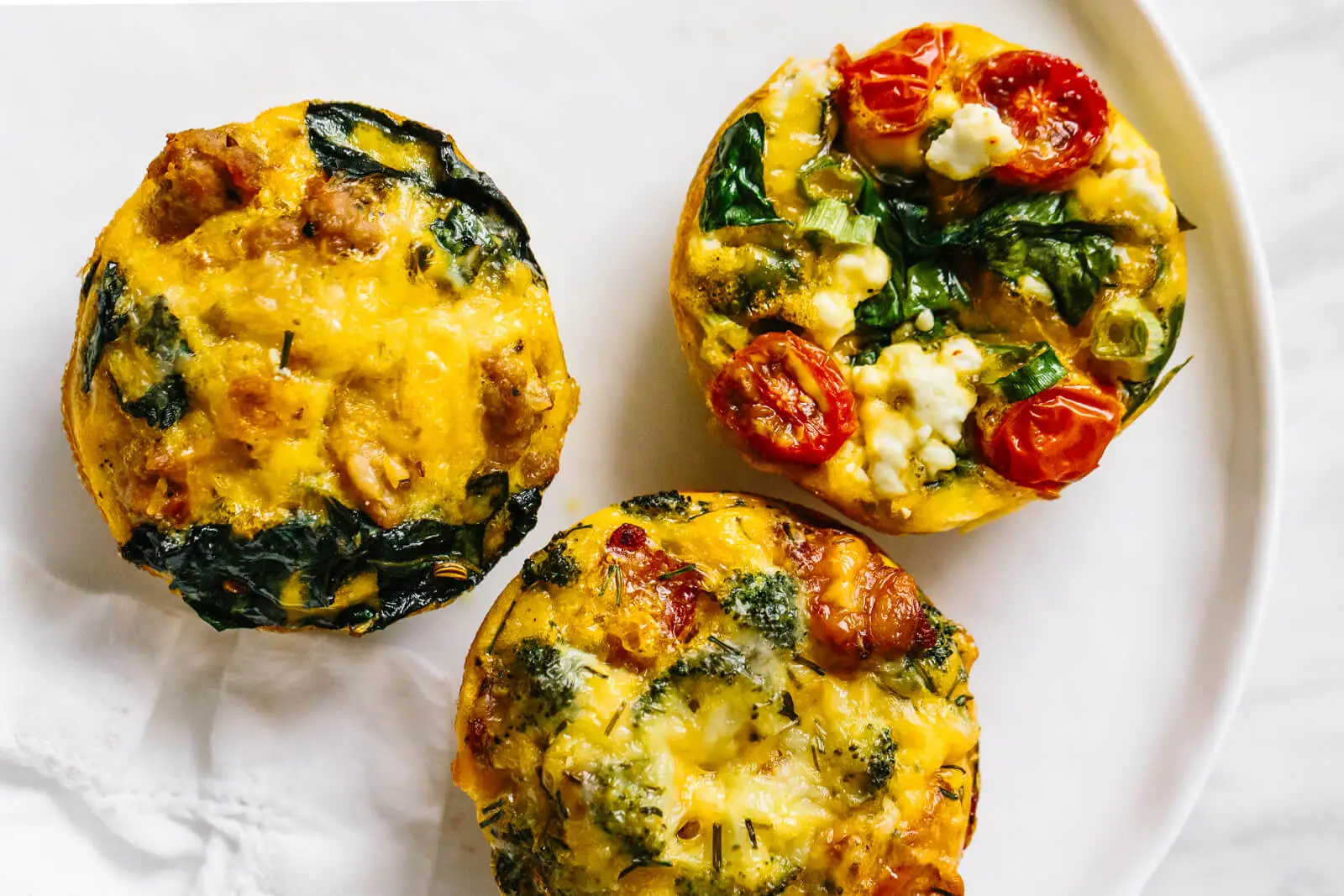 20 High-Protein Low-Calorie Breakfast Ideas (Under 400 Calories) | Eati: [Egg Muffins (Meal Prep Friendly)](/blog/egg-muffins-meal-prep-recipe) — illustration for this section
